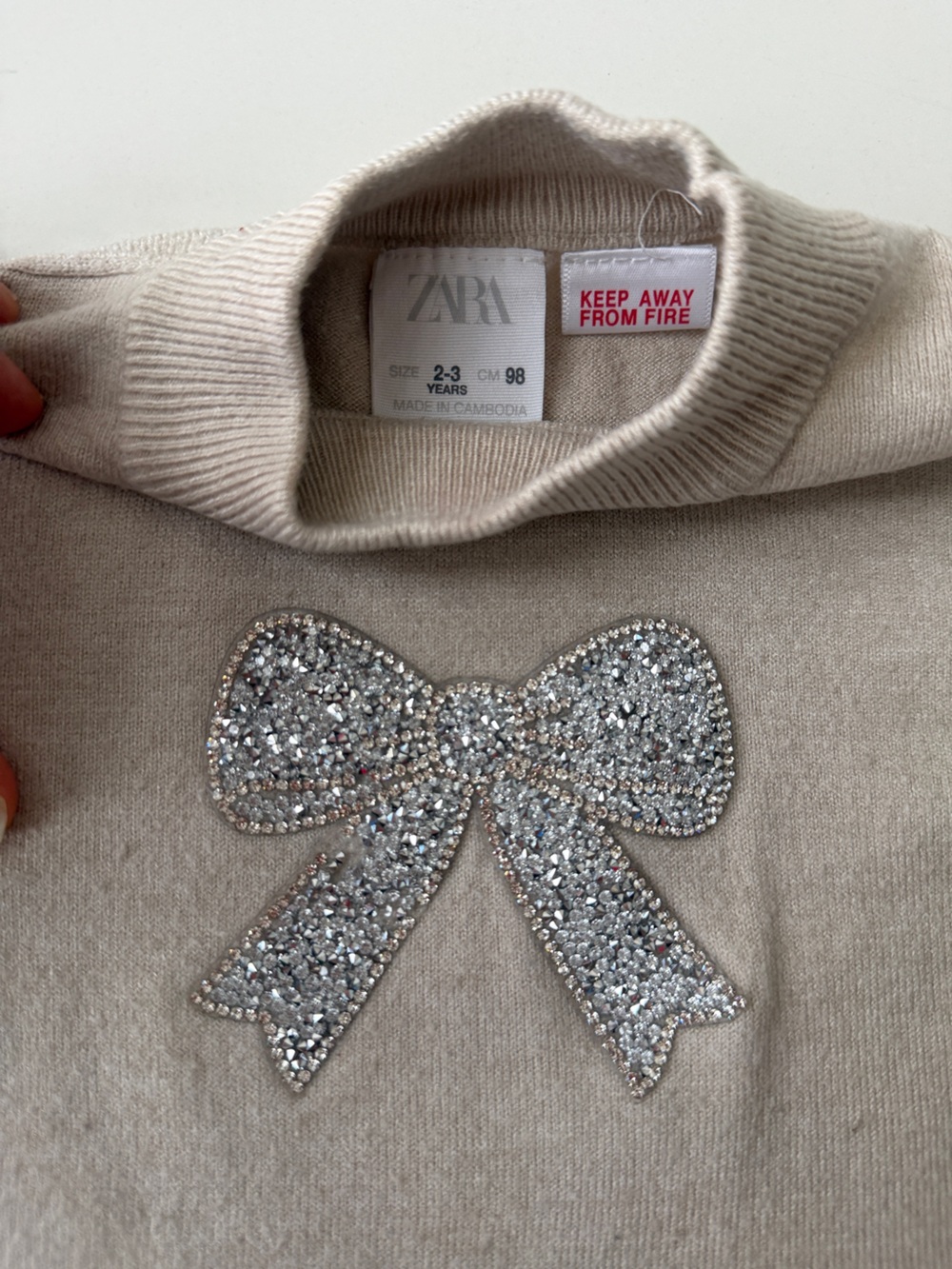 0004 Zara Kids Cream Sweater with Sparkling Silver Bow